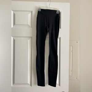 Black fabletics leggings with a pocket in the back